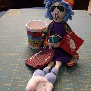 NWT Maxine doll with wrapped package